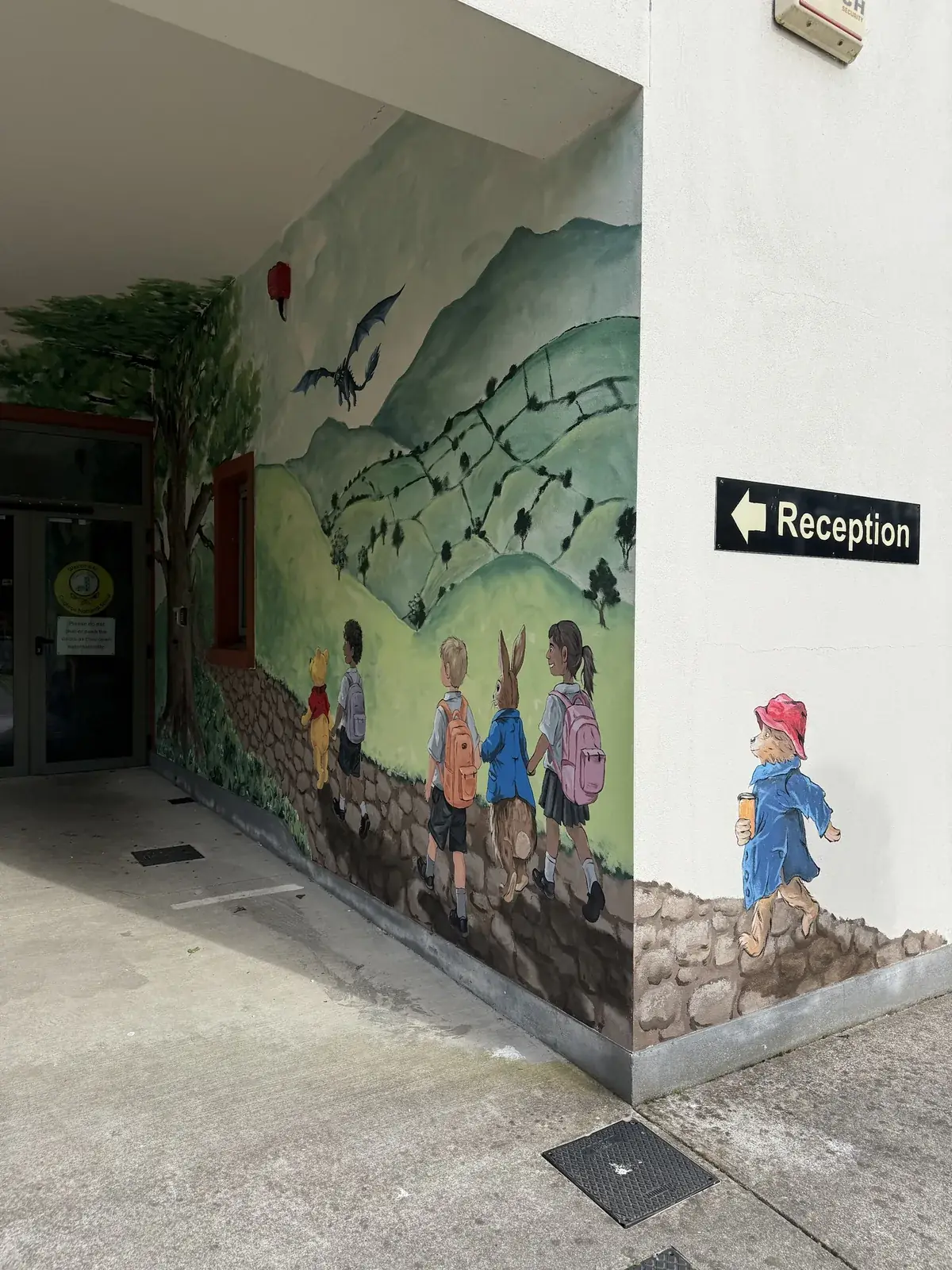 Colourful mural at a school entrance